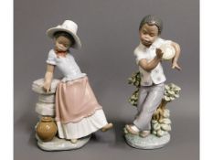 A pair of Lladro figures of children, nos. 5157 &