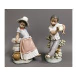 A pair of Lladro figures of children, nos. 5157 &