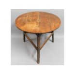 An 18thC. George III elm cricket table, approx. 33