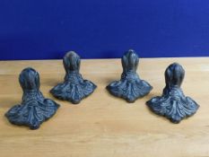 Four antique Coalbrookdale style cast iron bath fe