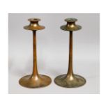 A pair of bronze Dryad Lester art & crafts candle