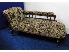 An early 20thC. upholstered chaise longue, 65.5in