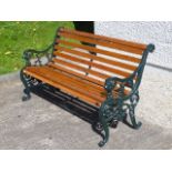 A modern garden bench with cast iron ends, 49.5in