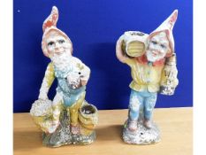 A pair of garden gnomes, some faults & wear, 23.5i