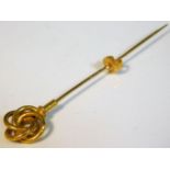 A antique yellow metal stick pin with French marke