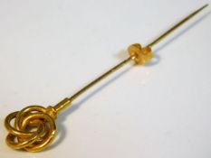 A antique yellow metal stick pin with French marke