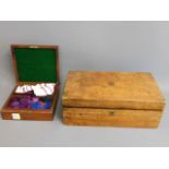 An antique mahogany box with bow ties twinned with