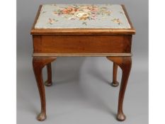 A c.1910 G. W. Hicks & Son mahogany music stool on