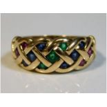 A 9ct gold ring with lattice design set with ruby,
