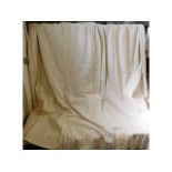 A good quality pair of lined cream curtains, appro