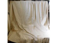 A good quality pair of lined cream curtains, appro