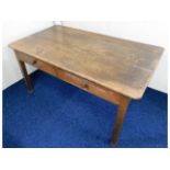 An early 20thC. oak library table with one true &