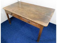 An early 20thC. oak library table with one true &