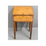 An antique pine school desk, 36.25in high x 21.25i