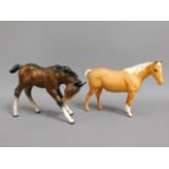 Two Beswick horses, tallest 4.75in, Palomino has t