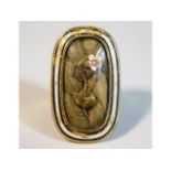 A 19thC. yellow metal closed back memorial ring, t