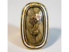 A 19thC. yellow metal closed back memorial ring, t