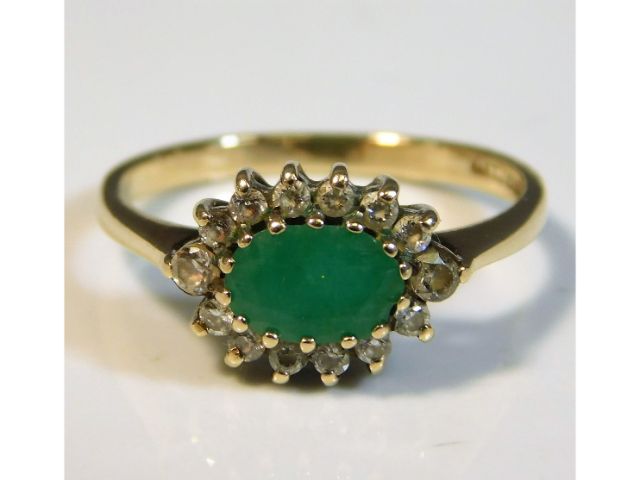 A 9ct gold emerald & white stone ring, size L/M, 2