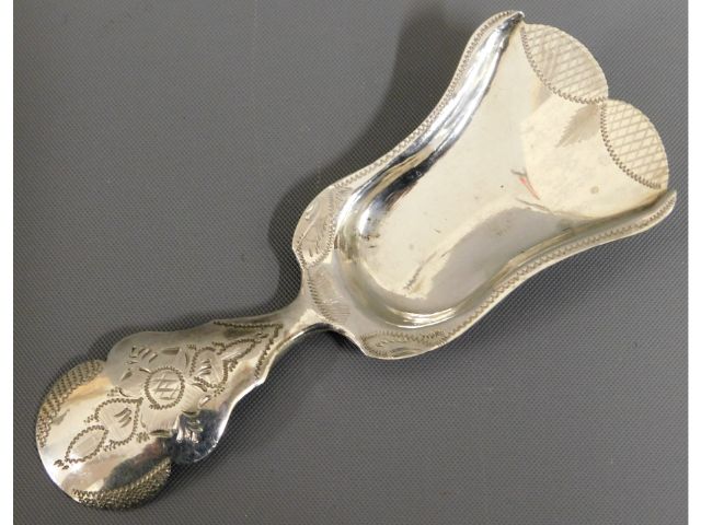 An 1874 Dutch 0.833 silver caddy spoon, 3.25in lon