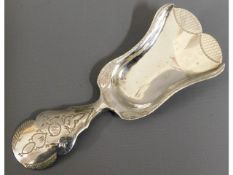 An 1874 Dutch 0.833 silver caddy spoon, 3.25in lon