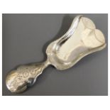 An 1874 Dutch 0.833 silver caddy spoon, 3.25in lon