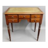 A 1920's mahogany lowboy with ringed tapered legs,