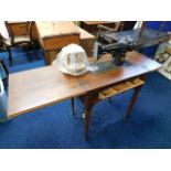 A mahogany Singer sewing machine table & accessori