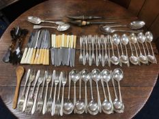 A quantity of various pieces of cutlery, including