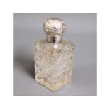 A 1902 Birmingham silver topped glass scent bottle