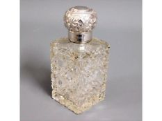 A 1902 Birmingham silver topped glass scent bottle