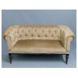 An early 19thC. Regency period button back sofa wi