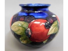 A small Moorcroft pottery fruit & berry vase, 2.75