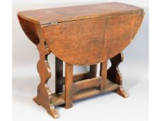 A small 1920's oak gate leg table, 24.25in wide x