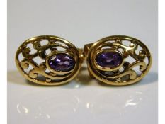 A pair of 9ct gold amethyst earrings 2g, 13mm high