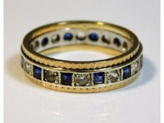 A 9ct white stone & sapphire two colour gold etern