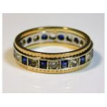 A 9ct white stone & sapphire two colour gold etern