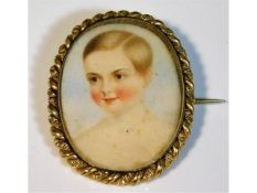 A 19thC. closed back yellow metal brooch with wate