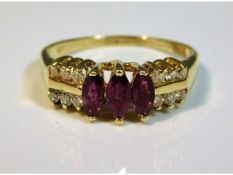 A 14ct gold ring set with diamond & ruby, size N,
