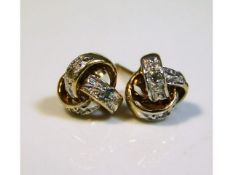 A pair of 9ct gold & diamond earrings, 1.1g