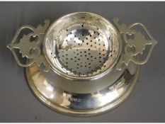 A 1939 Lanson Ltd. Birmingham silver tea strainer