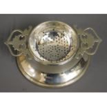 A 1939 Lanson Ltd. Birmingham silver tea strainer