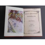 A Lewis Carroll Alice In Wonderland book with illu