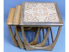 A G-Plan retro teak nest of tables with tile inlay