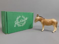A boxed Beswick donkey, 5.25in tall