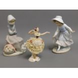 A Lladro & Nao figure, fault with hoop, twinned wi