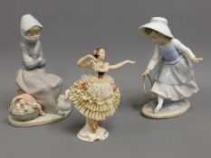 A Lladro & Nao figure, fault with hoop, twinned wi