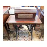 An electric Singer sewing machine & table