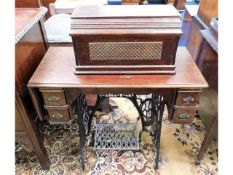 An electric Singer sewing machine & table