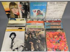 A quantity of twenty four vinyl LP albums, includi