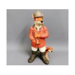 A resin Fox & Hound garden ornament type figure, 1